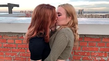 Two European students have lesbian sex on the roof of a house